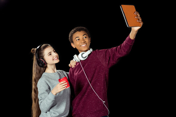 Two Teens Posting Selfie on Social Media