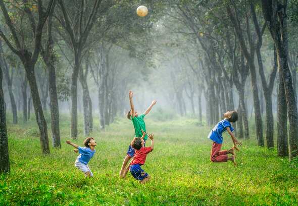 Kids Playing Soccer (Football)