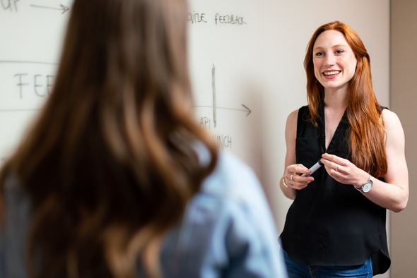 Teaching tutor providing feedback to parents