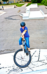 Boy on Bicycle in Bike Park
