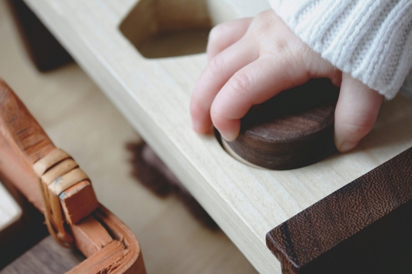 Sensory Experience of Perception and Interaction when playing with wooden toys.