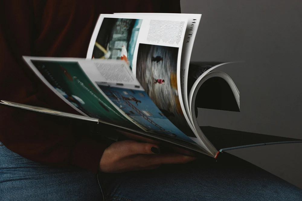Someone flipping through the pages of a picture book.