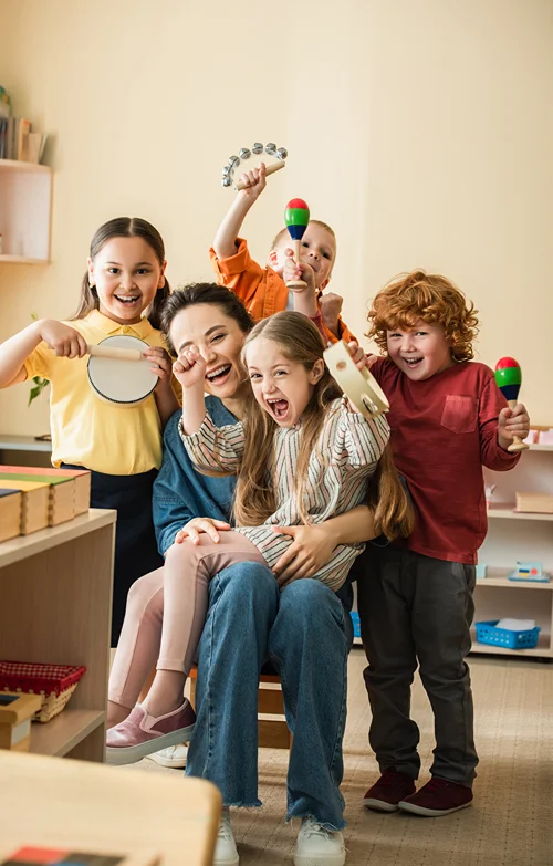 Kindergarten kids playing musical instruments.