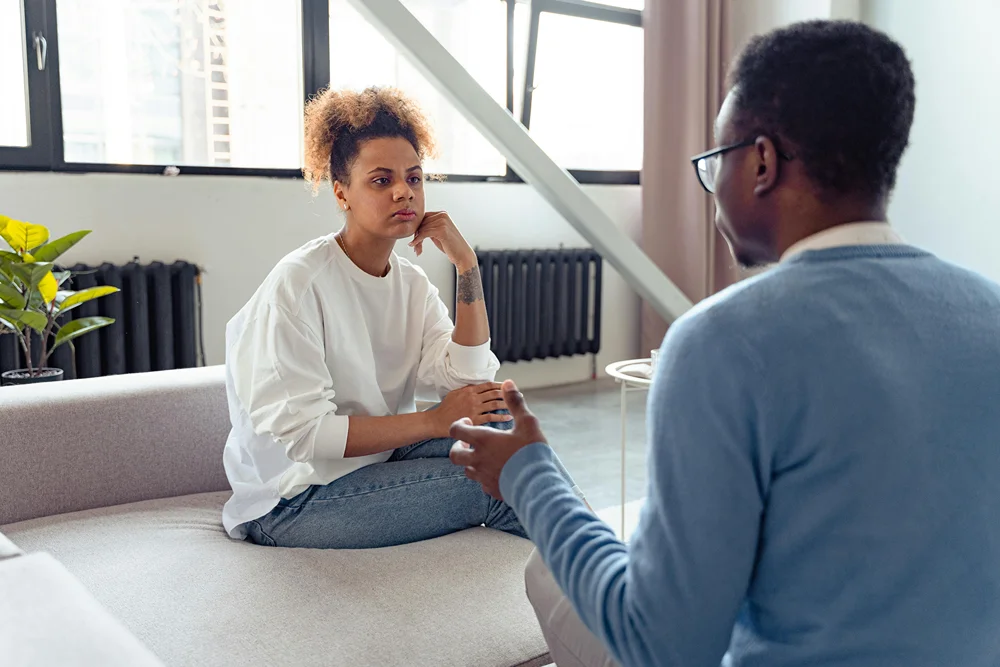 A counselor meeting with a patient.