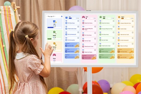 Girl looking at large Cozyla Calendar
