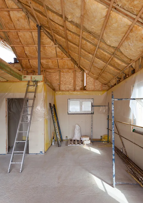 An unfinished attic with great potential for a kids playroom.