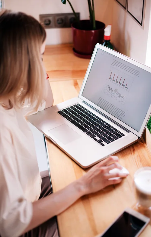 A young woman taking college online.