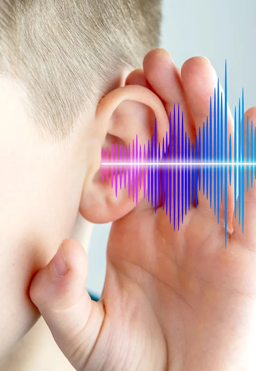 Imaginary sounds waves are shown as a boys holds his hand up to his ear.